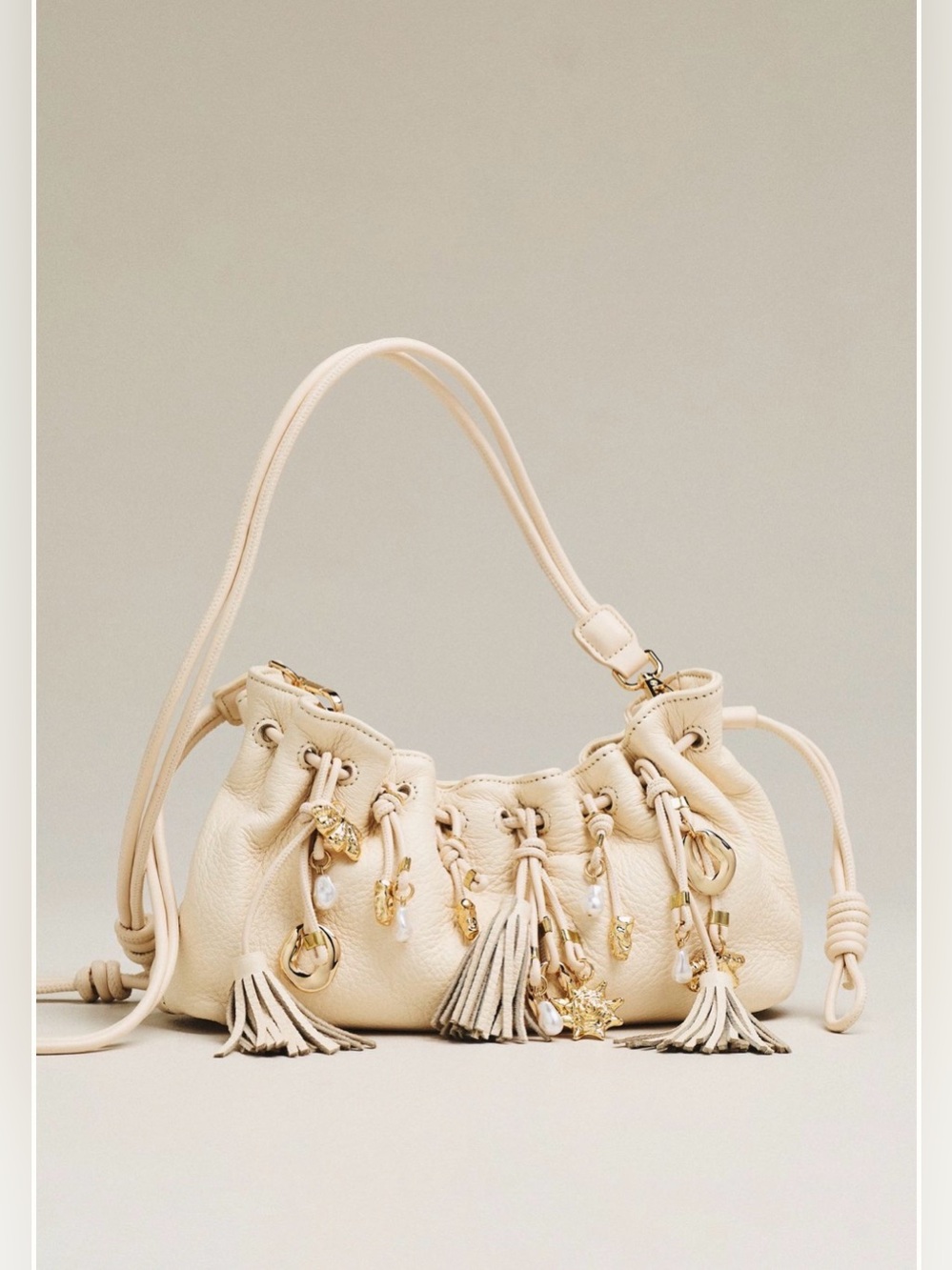 Dolce Vida Cream leather Tori Charm Crossbody bag